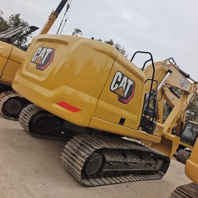 Excavateur à roues 320d2gc d'occasion avec 1200 heures de travail en excellent état